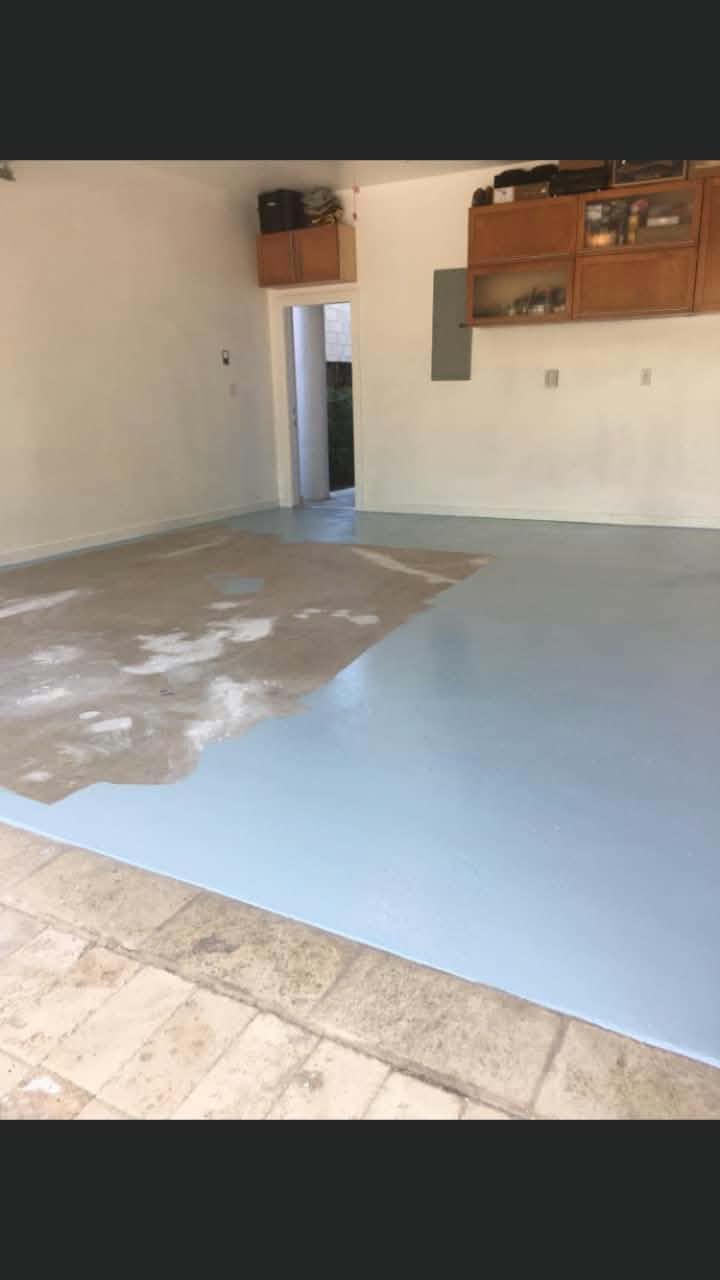 Garage floor coating application in progress. — garage floor coating, epoxy floor coating, floor refinishing