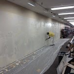 Commercial retail aisle walls repainted with minimal disruption to business - commercial painting.