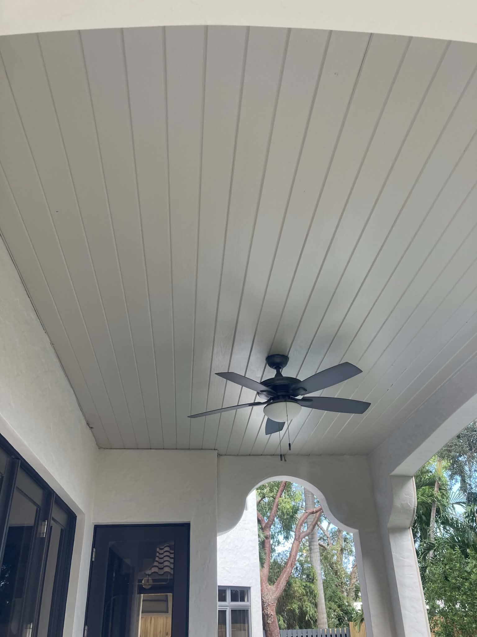 Covered outdoor lanai ceiling freshly painted. — lanai ceiling painting, outdoor ceiling painting, covered porch painting