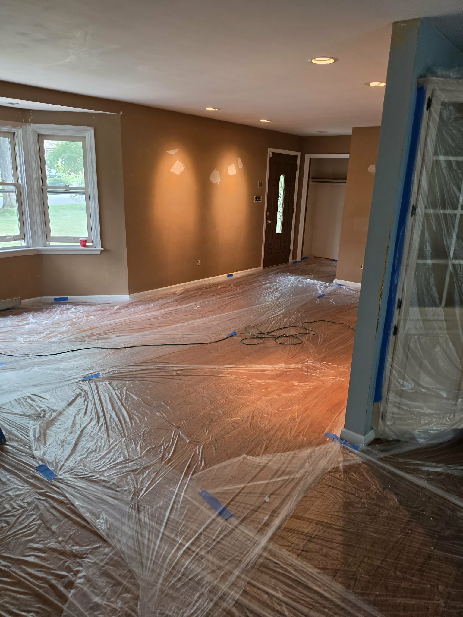 Living room drywall patch repair and repaint prep — drywall patch repair, interior painting Easton PA, living room repaint, Randy's Painting & Drywall Services, Lehigh Valley painters, Bucks County drywall repair, house painters near me